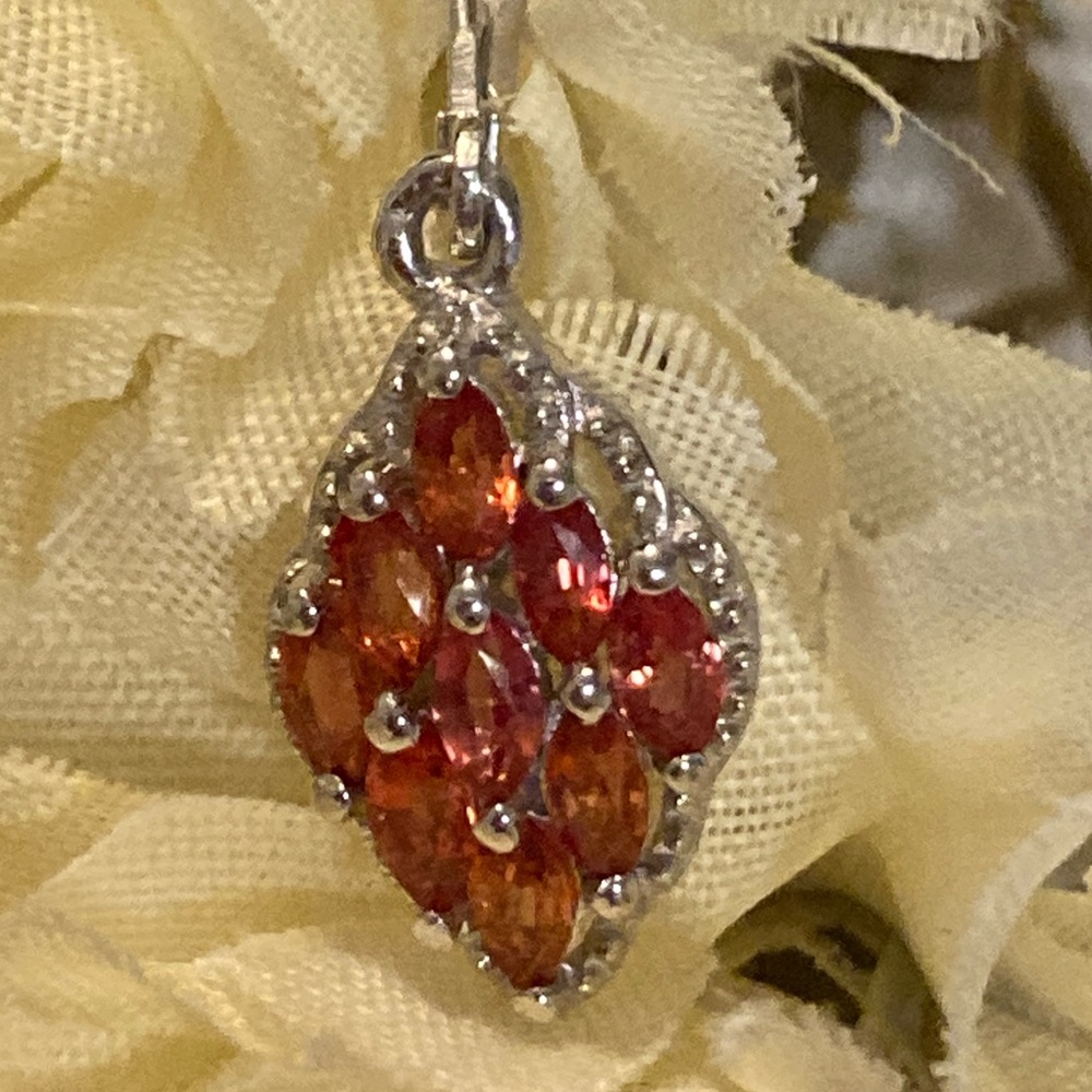 PRE-OWNED GENUINE .925 ORANGE SAPPHIRE NECKLACE. Worn only once or twice by me.